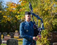 Captain Fraser Clark performs the Piper's lament while spectators stand in a moment of silence during the memorial commemoration of Sergeant(Retired) Nadine Manning, who was the last remaining Imagery technician that served in World War 2.  This photo was taken at Lakehead Cemetery in Point-Claire, Quebec on November 6th, 2021.

Please credit: Cpl Thomas Lee, Canadian Forces Combat Camera, Canadian Armed Forces Photo