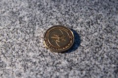 A symbolic coin representing the Imagery Technician trade, presented during the memorial commemoration of Sergeant(Retired) Nadine Manning, who was the last remaining Imagery technician that served in World War 2.  This photo was taken at Lakehead Cemetery in Point-Claire, Quebec on November 6th, 2021.

Please credit: Cpl Thomas Lee, Canadian Forces Combat Camera, Canadian Armed Forces Photo