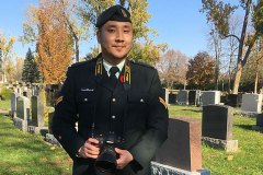 Cpl. Thomas Lee poses with camera, Lakeview Memorial Cemetery, Pointe-Claire, QC., Remembrance Ceremony in Honour of Sgt. (Ret) Nadine Manning.